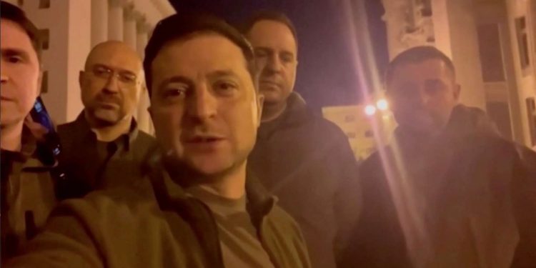 a second day marked by escalating sanctions and fighting around Kyiv